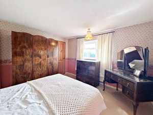 Bedroom One- click for photo gallery